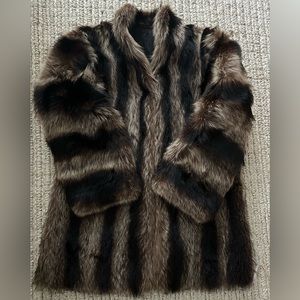 Vintage Raccoon Fur coat. Excellent condition. Only had one previous owner.